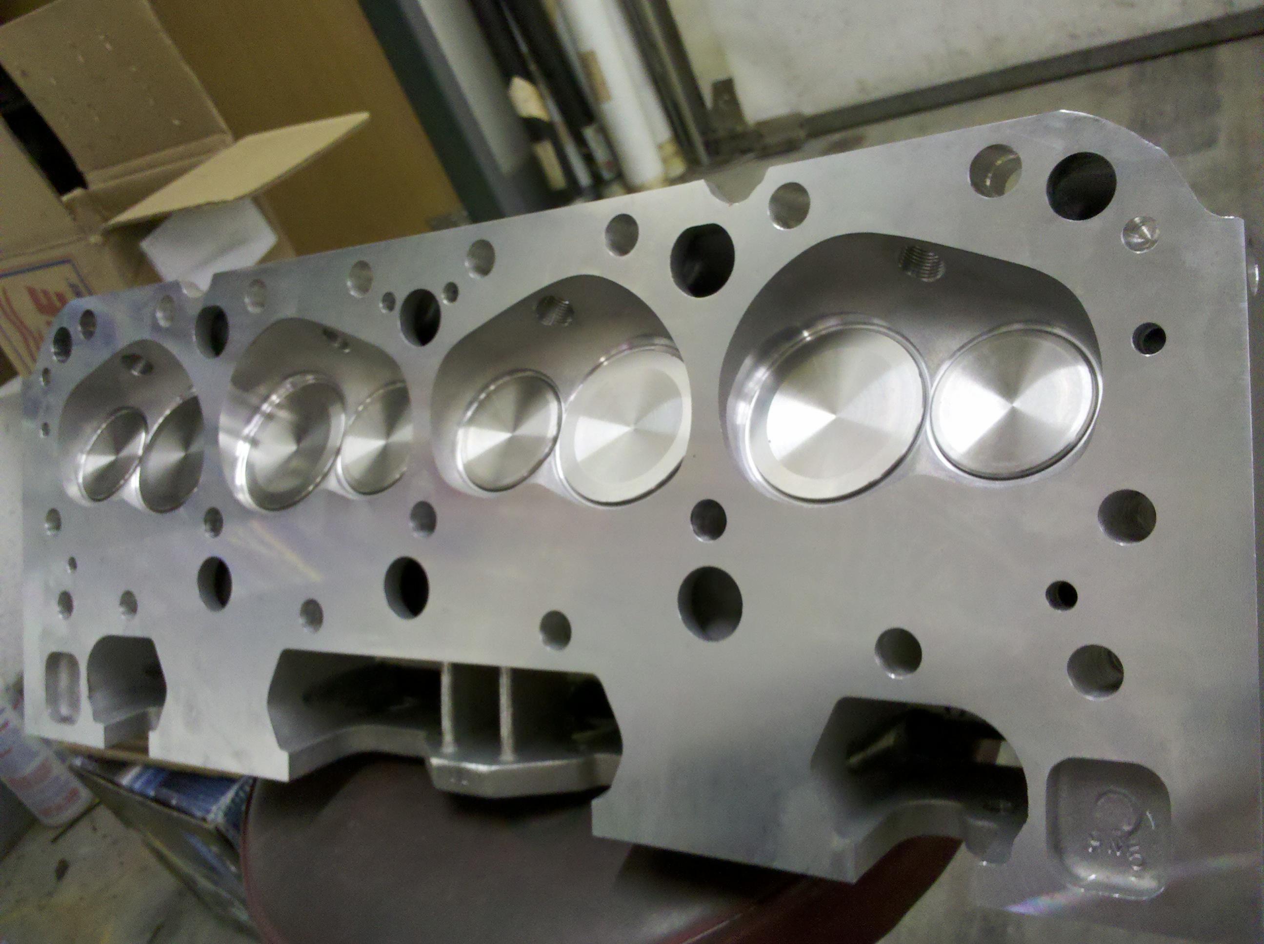 High Velocity Heads - Our latest set of Enginequest SBC 220 cast-iron cylinder  heads with our CNC porting and Super Compression deck milling. Chambers are  fully ported and mailed down to only